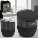 Black speaker with 'updata partners' branding and packaging on a white background