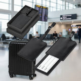 Black leather luggage tag with attached card holder on a white background